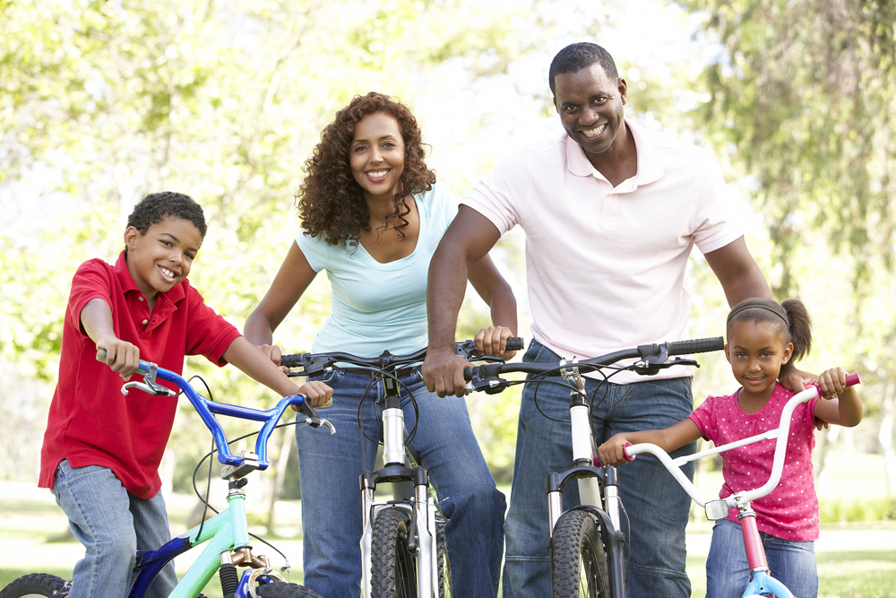 family biking together